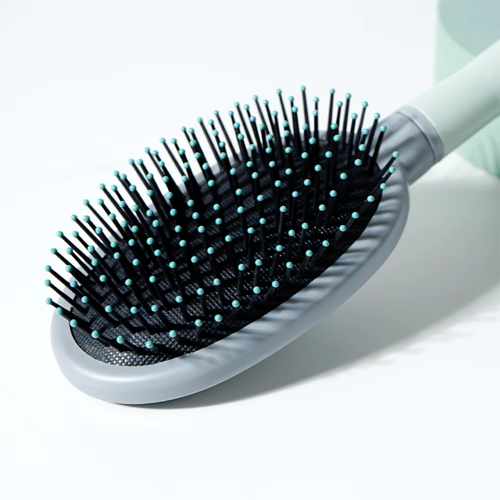 Brosse à cheveux démêlante pour cheveux ondulés/bouclés