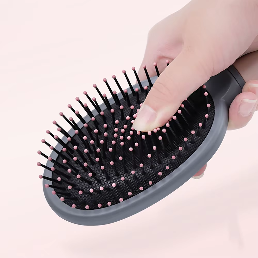 Brosse à cheveux démêlante pour cheveux ondulés/bouclés