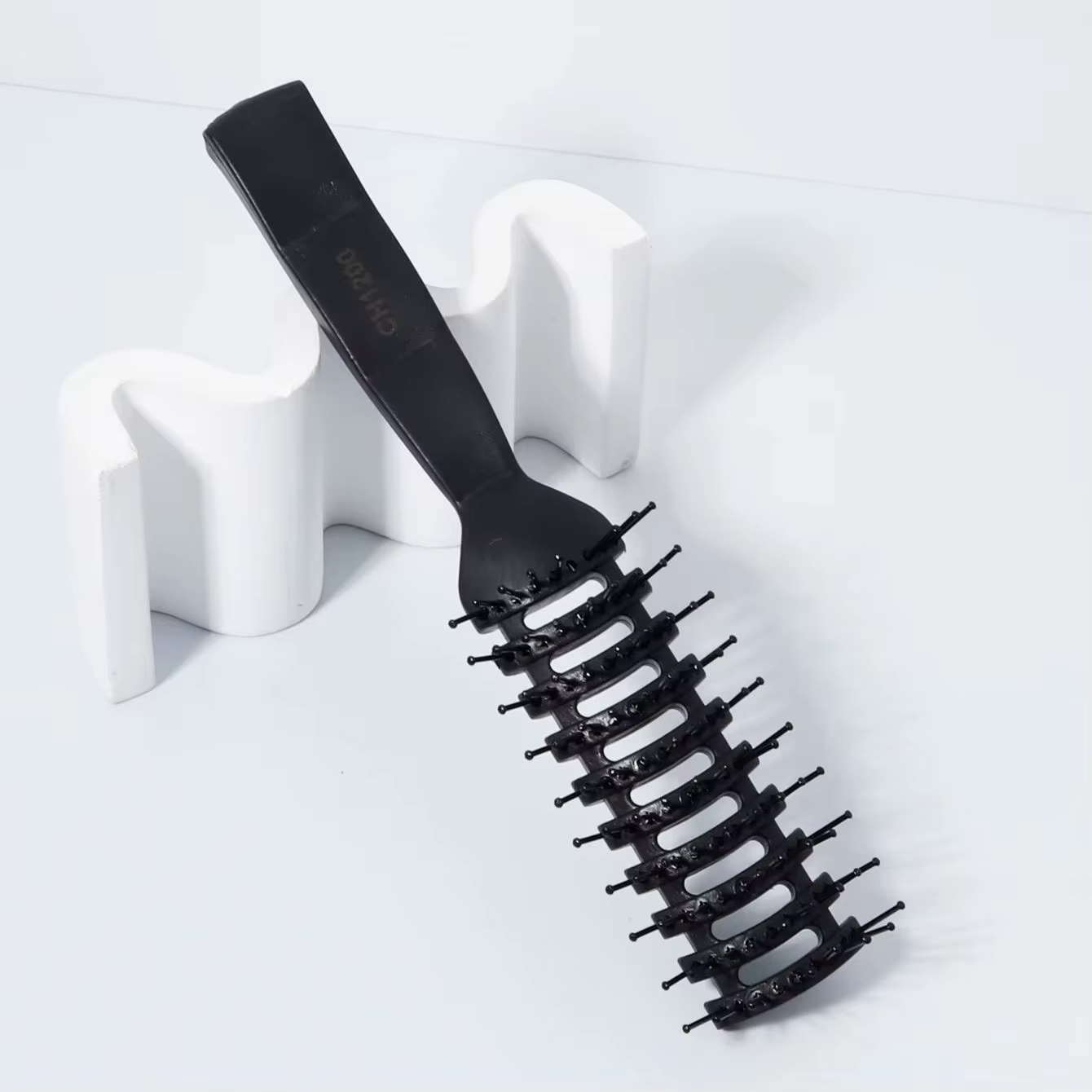 Peigne professionnel à picots pour coiffage et massage