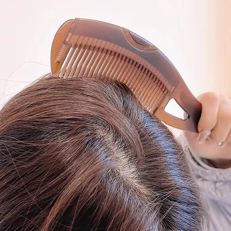 Peigne de massage anti-pelliculaire
