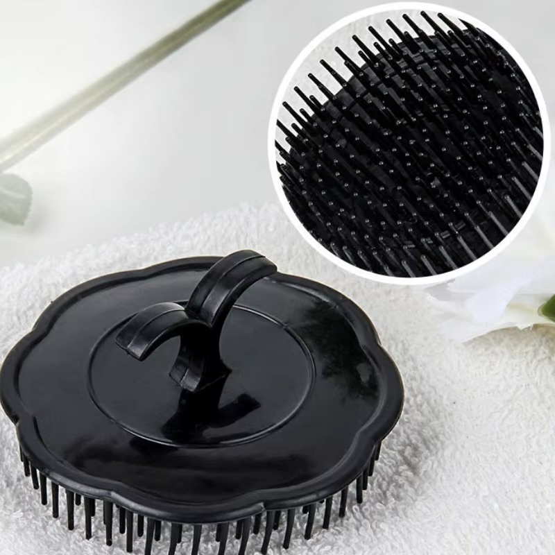 Brosse de massage et de lavage pour le cuir chevelu