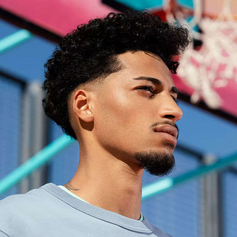 Prothèse capillaire pour hommes à cheveux bouclés